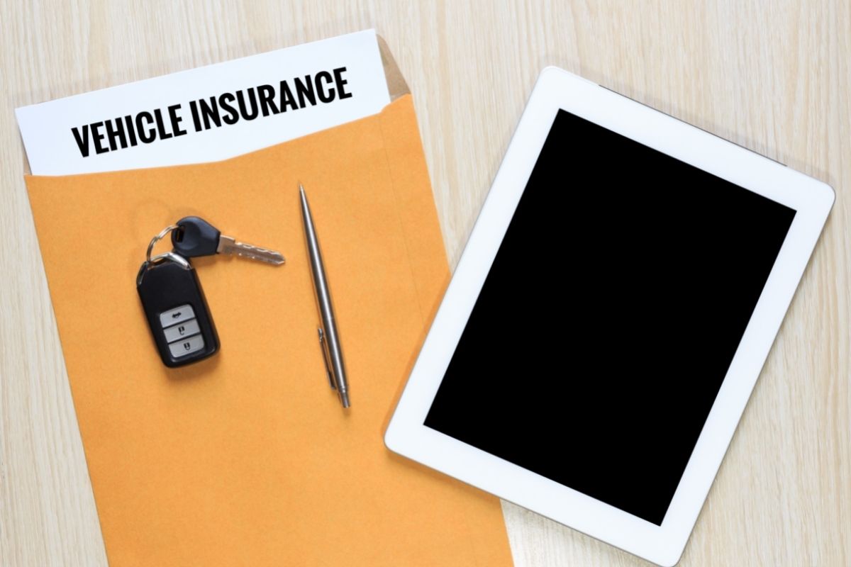 Vehicle insurance in envelope with tablet