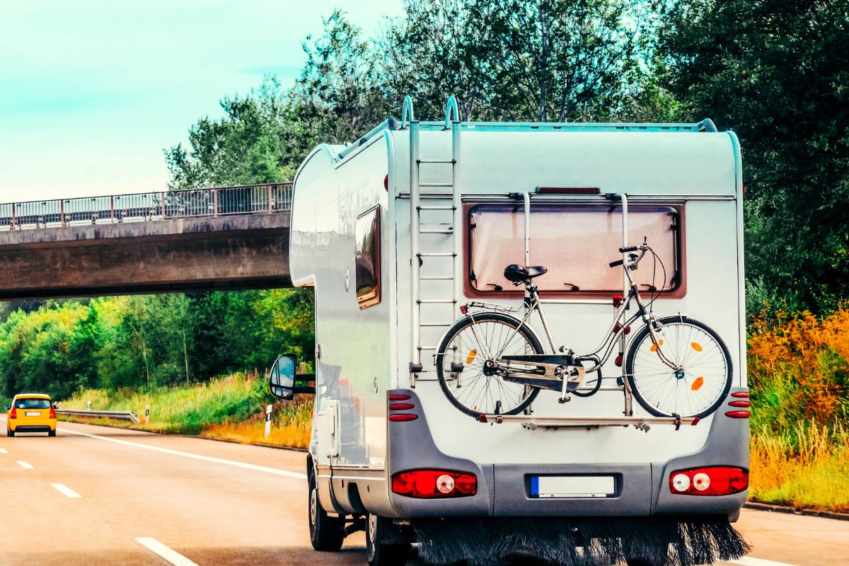 rv camper car with bicycle